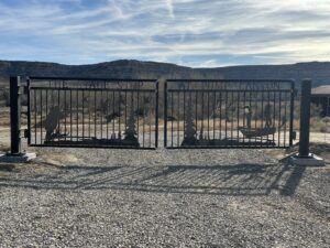 Navajo Dam Lodging: Stage Stop at Pump Canyon. Image of gates at entrance
